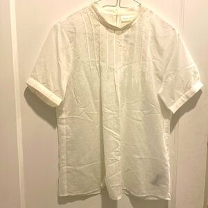 In wear- Brand new short sleeves sheer blouse.